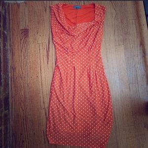 Vintage-inspired orange polka dot dress